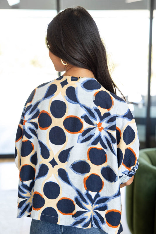 Flash of Fun Geometric Dolman Top