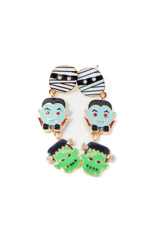 Pair of dangle earrings with halloween character designs on a white background