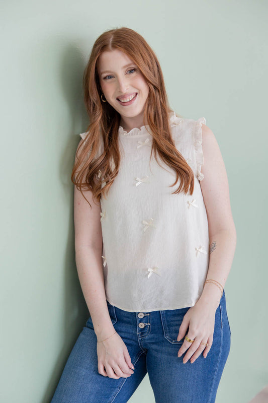 Bowtiful Day Sleeveless Ruffle Trim Top