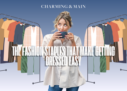 Woman holding a coffee mug between two clothing racks, with the text "The Fashion Staples That Make Getting Dressed Easy" displayed across the image.