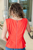Glow Up Sleeveless Peplum Top