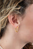 Sleek Luster Gold Oval Huggie Hoop Earrings