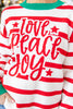 A close-up of a woman wearing a festive holiday sweater with red and white horizontal stripes, green ribbed collar and cuffs, and the words 'love peace joy' in red script across the front.
