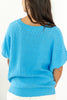 Smiles on Repeat Dolman Top