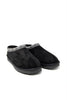 A pair of black suede slip-on slippers with a textured silver and black patterned trim around the opening, shown on a plain white background.